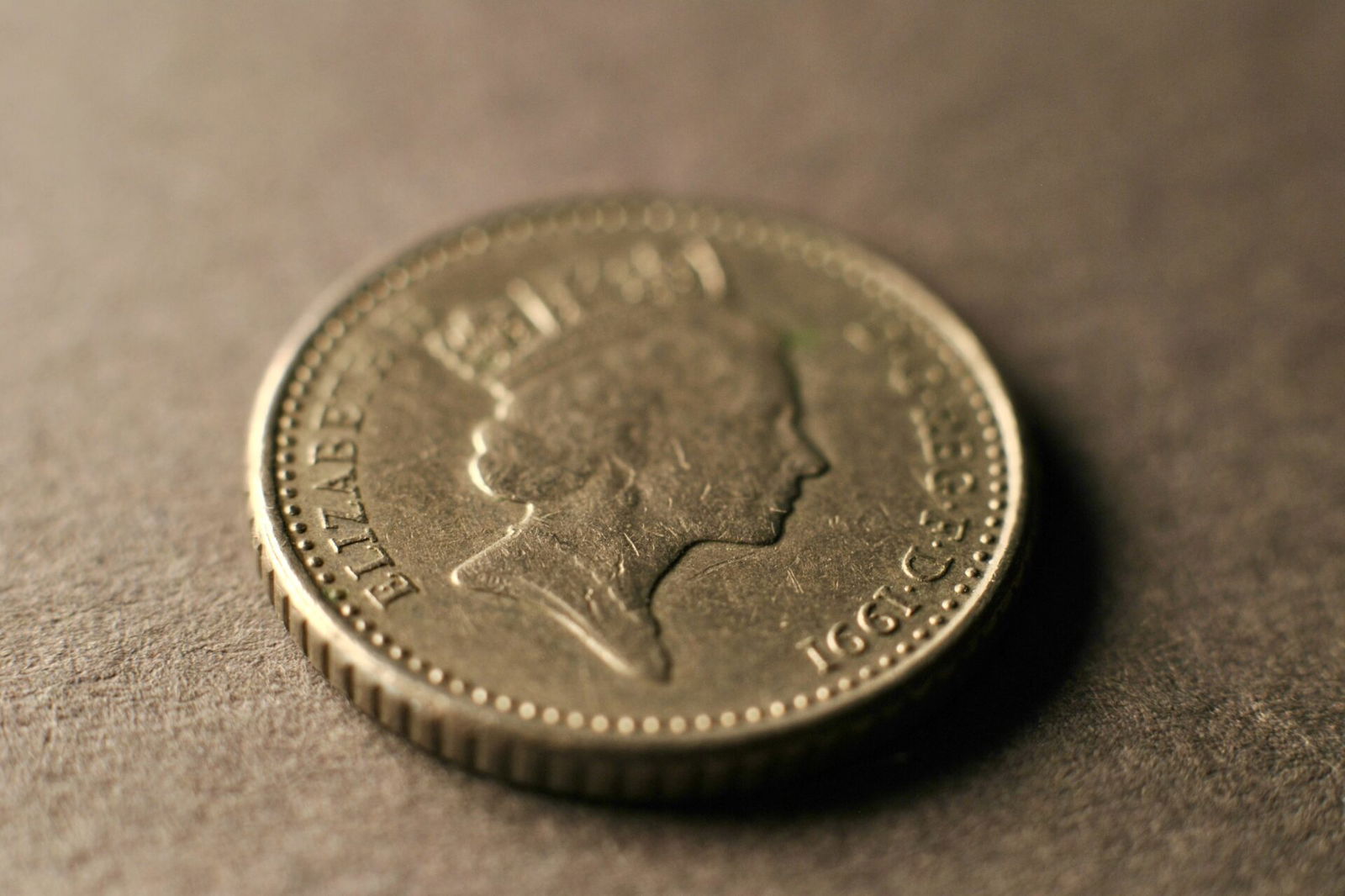 Lone coin on table