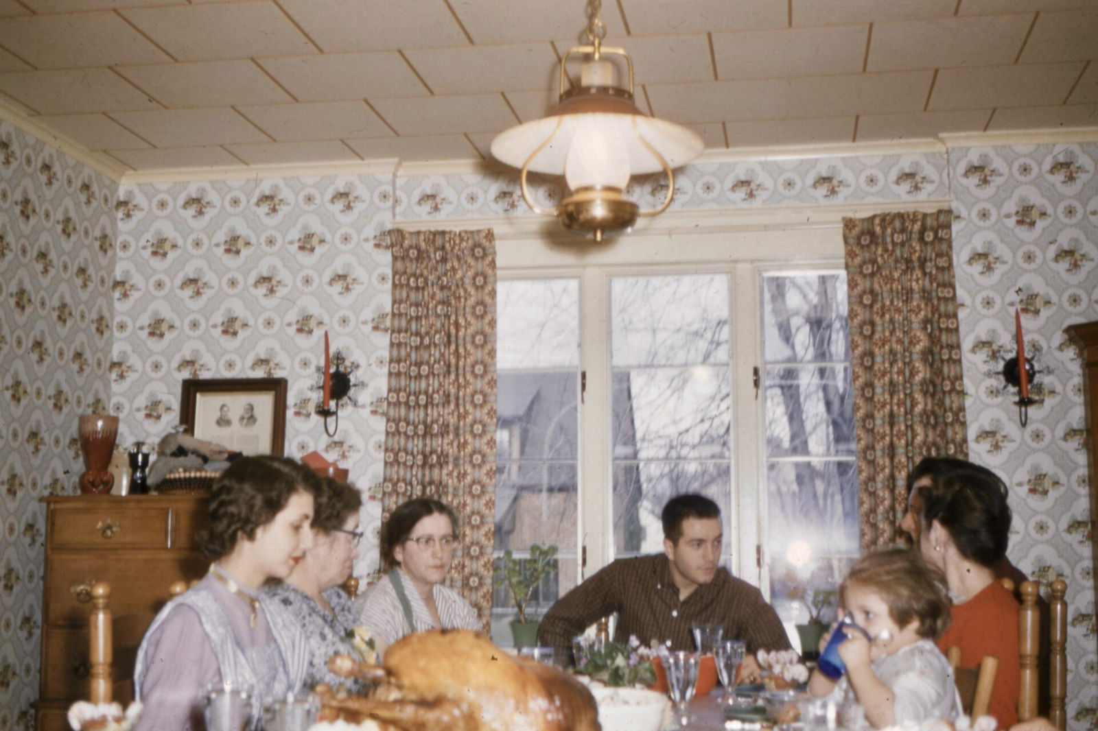 Family around dinner table