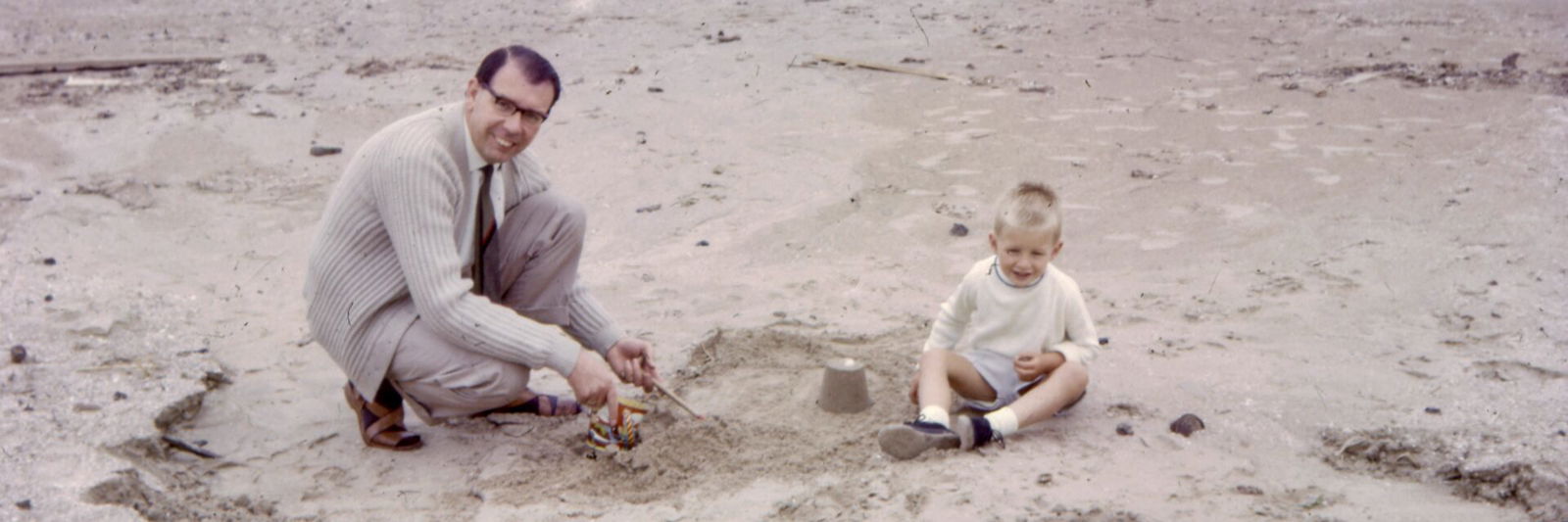 Father and son on beach