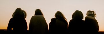 People looking out together