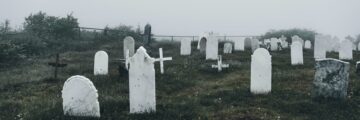 Cemetery with graves fog
