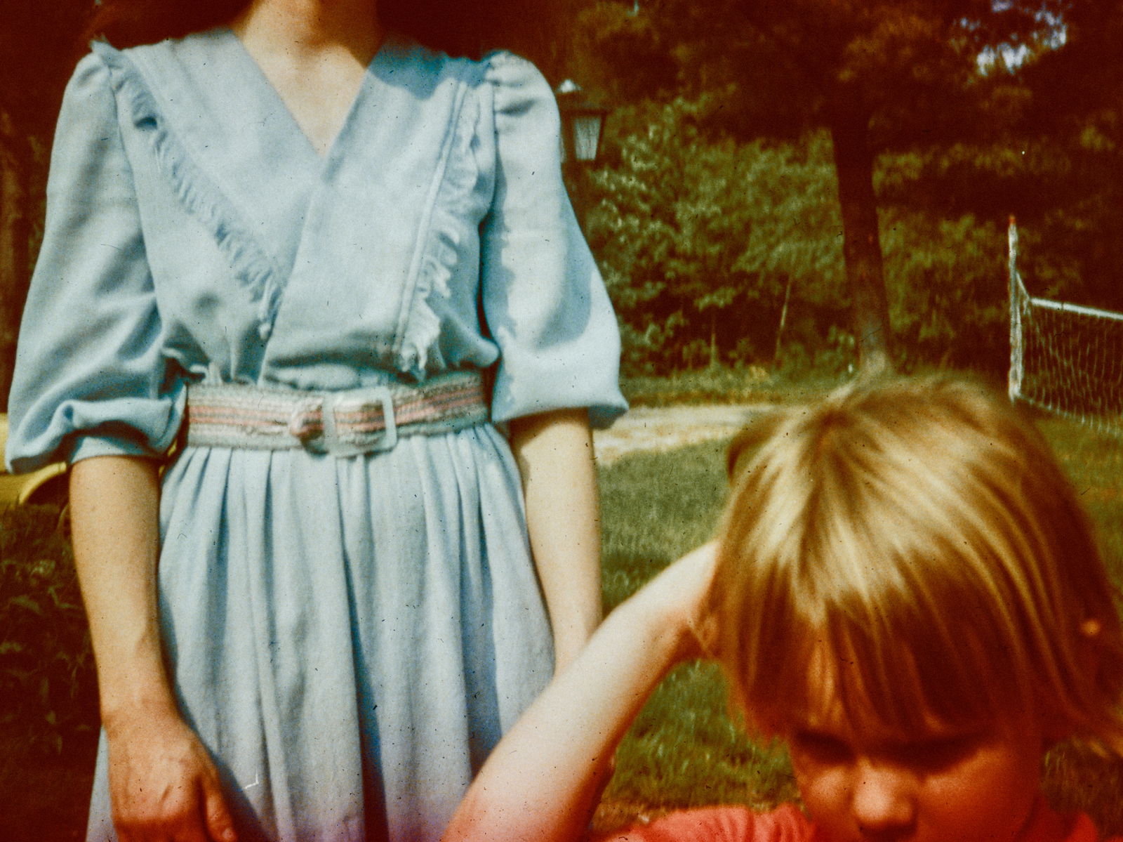 Child with parent outside