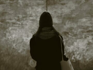 Person alone looking out